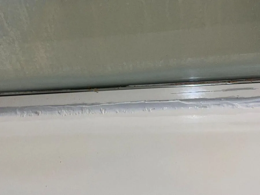 Fixture track cleared of calcium without hydrochloric acid handling