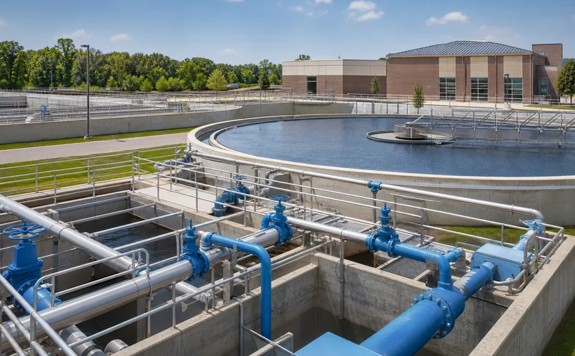Municipal water treatment plant basins and blue utility piping